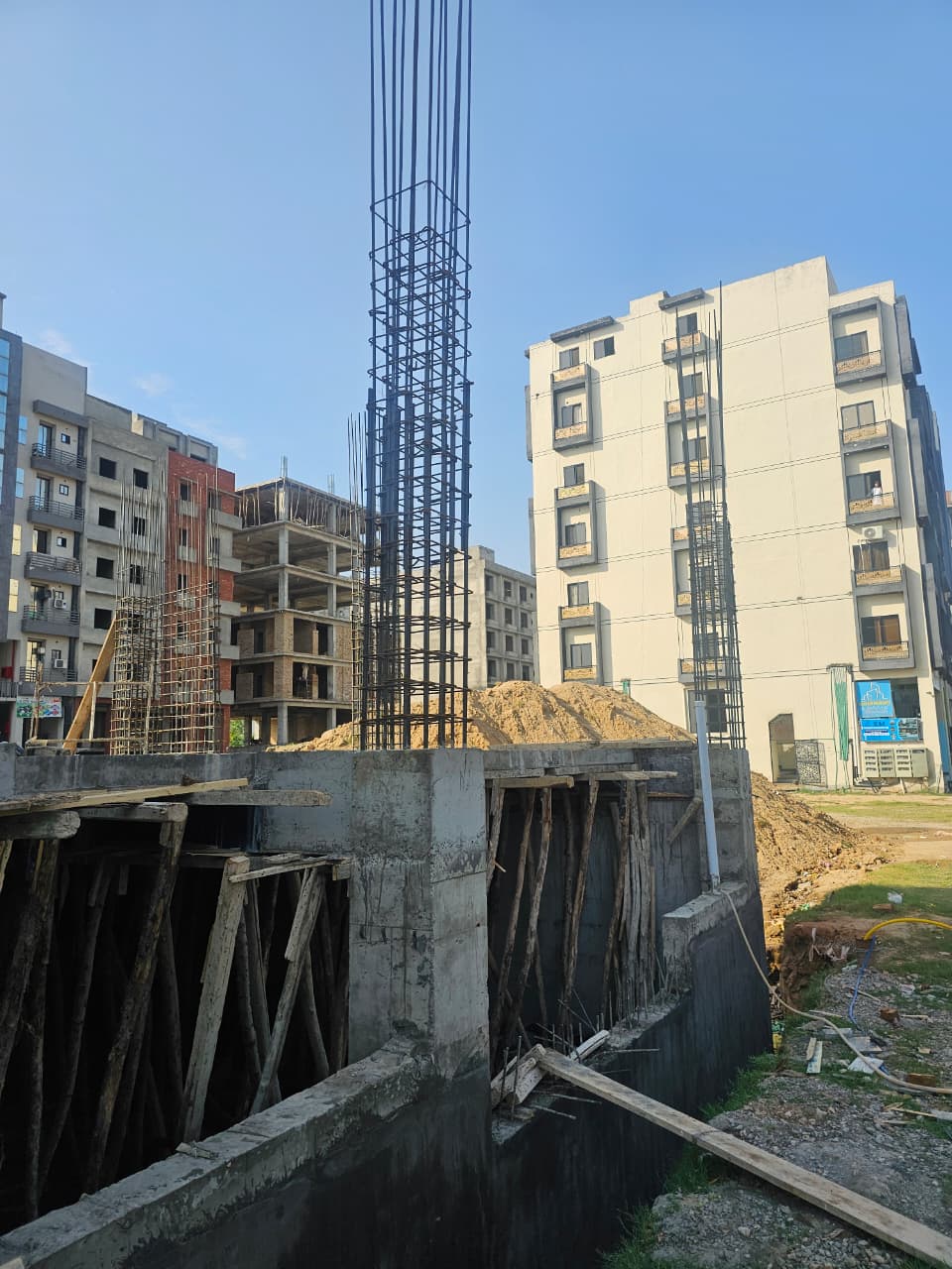 Site view ahead of structural grey frame work at AL ASIF TOWERS